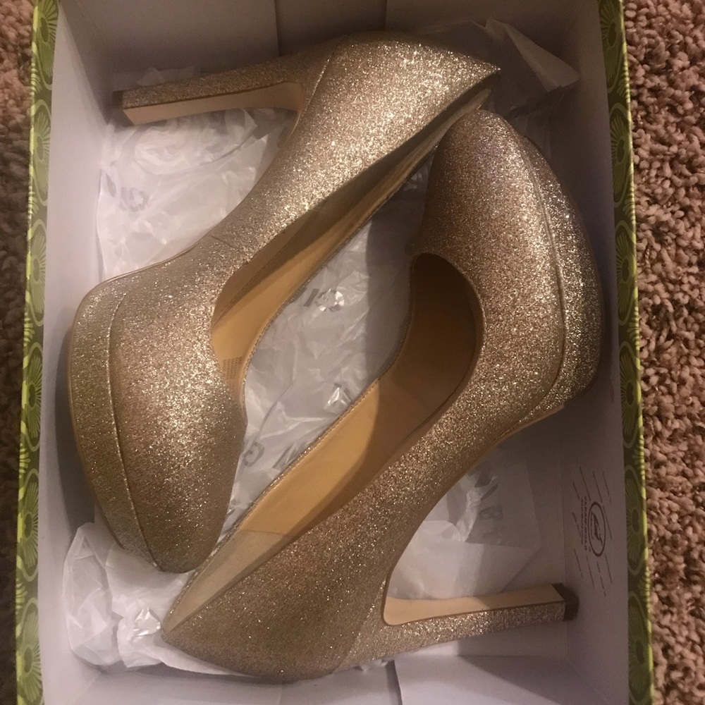 Gold high heels